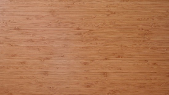 Image brown wooden surface with white paper