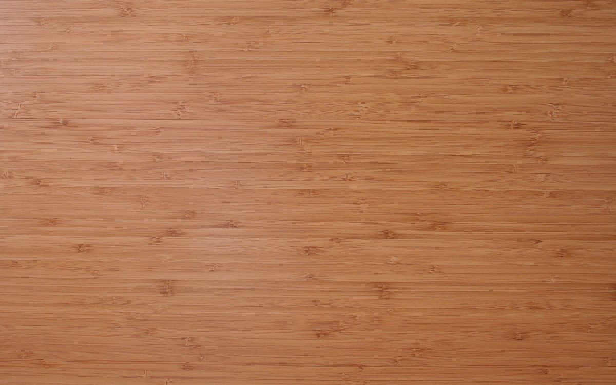 brown wooden surface with white paper