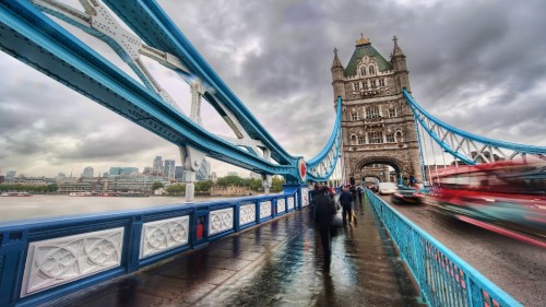 Image people walking on bridge during daytime