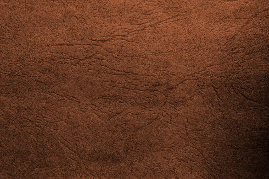 brown fur textile in close up photography