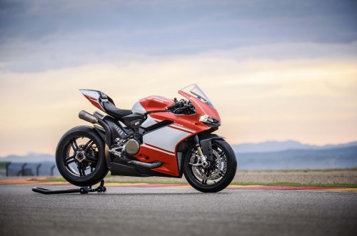 Image red and black sports bike on road during daytime