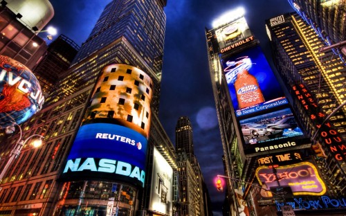 Image low angle photography of high rise building during night time