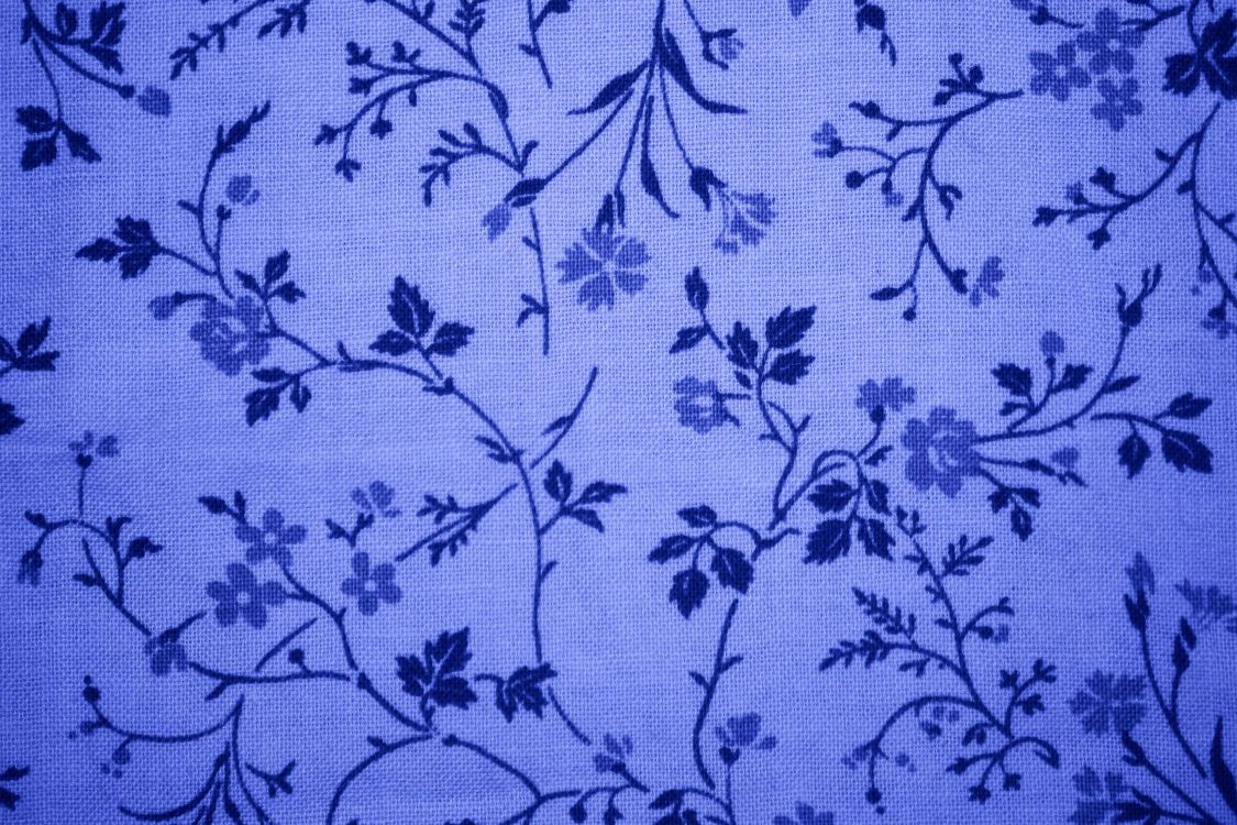 blue and white floral textile