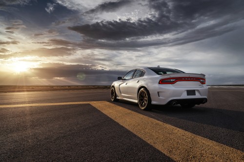 Image white porsche 911 on road under gray clouds