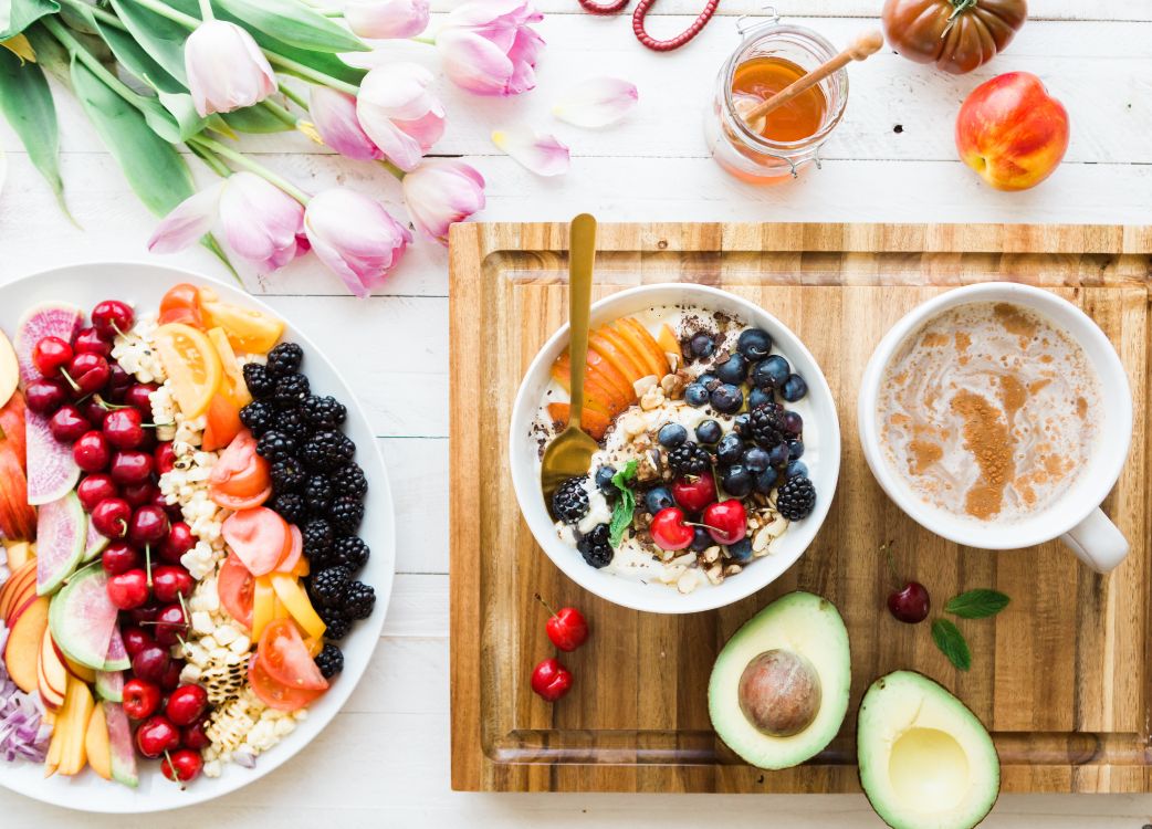 sliced fruits on white ceramic bowls