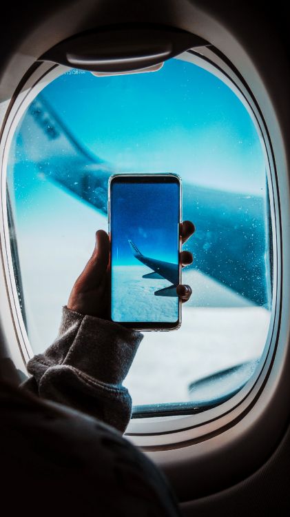 Vuelo, Iluminación Automotriz, Ventana, Azure, Espejo Automotriz. Wallpaper in 1800x3200 Resolution