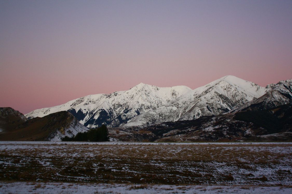 snow covered mountain during daytime