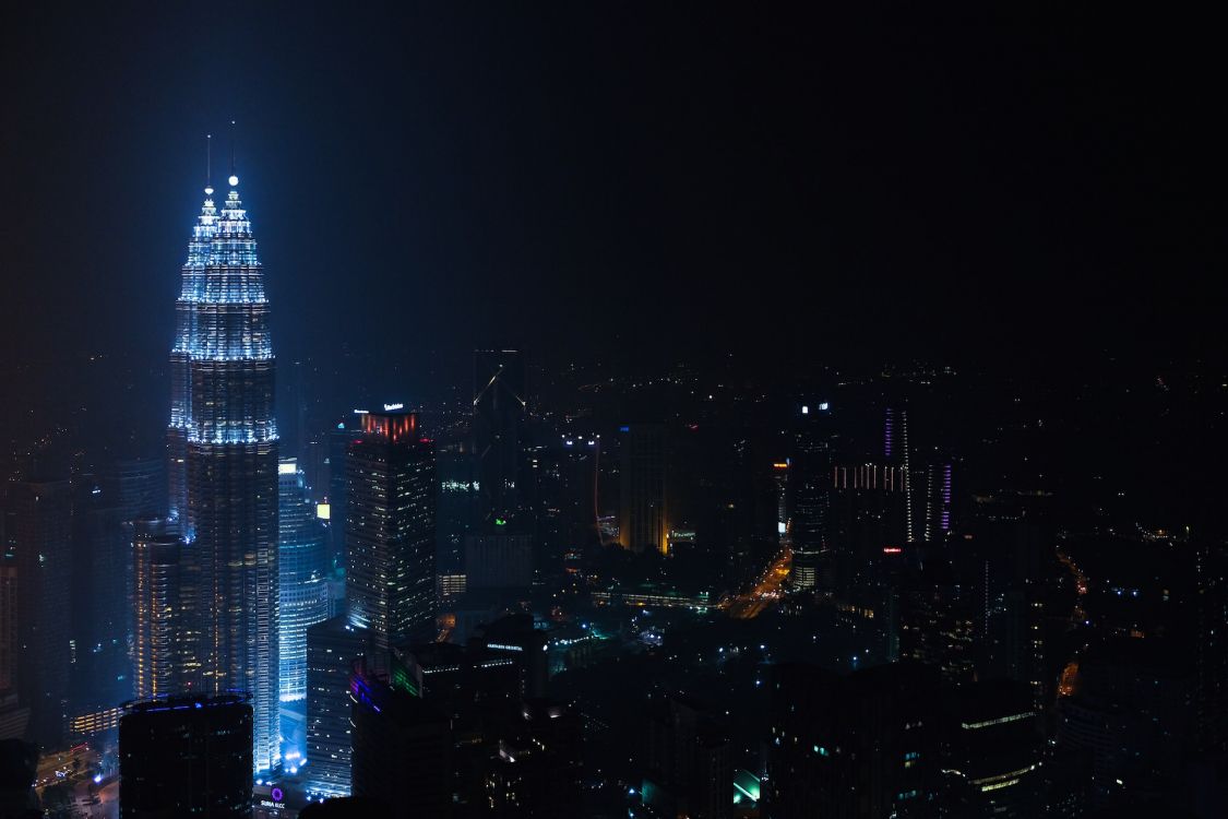 city skyline during night time