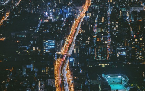 Image aerial view of city buildings during night time