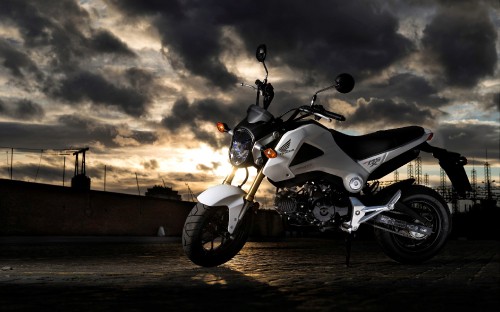 Image black and white sports bike on road during daytime