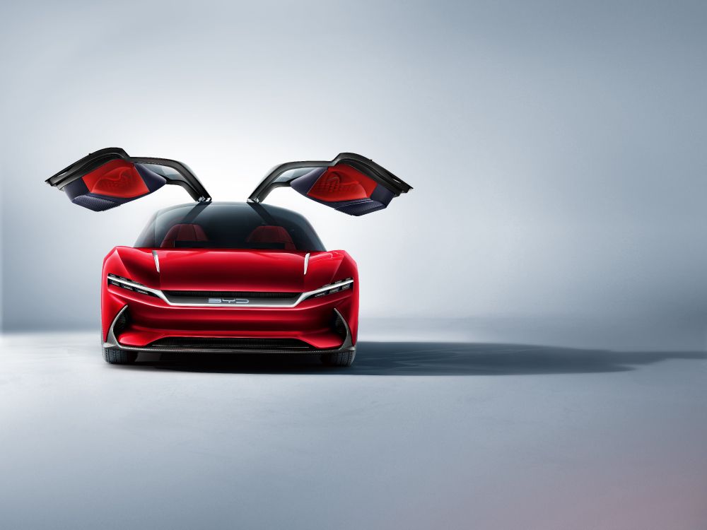 Roter Ferrari-sportwagen Auf Grauem Pflaster. Wallpaper in 8000x6000 Resolution