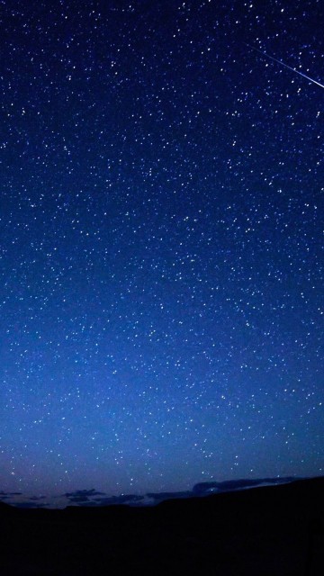 Image silhouette of mountain under blue sky during night time