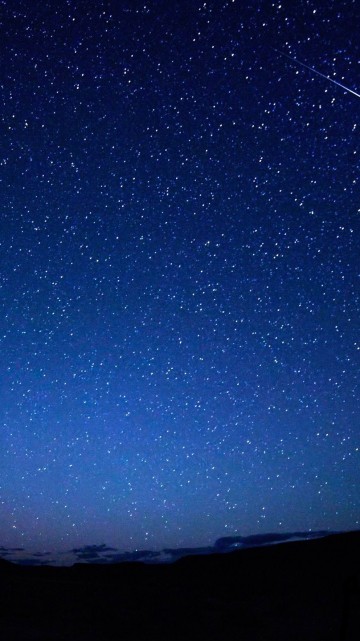 Image silhouette of mountain under blue sky during night time