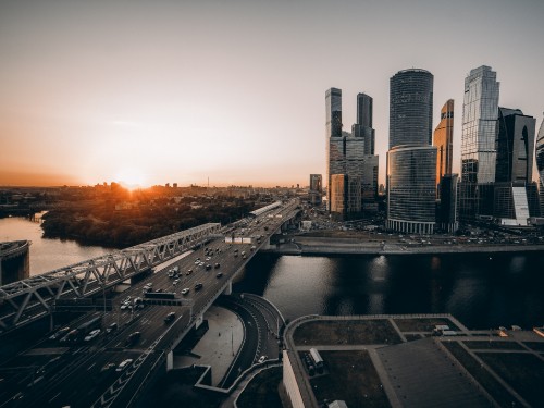 Image city buildings during orange sunset