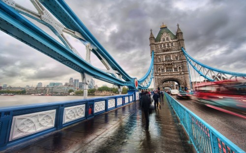 Image people walking on bridge during daytime