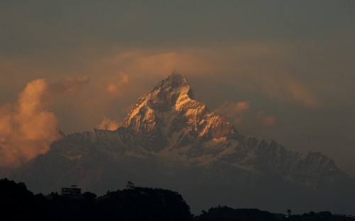 Image brown and white mountain under white sky during daytime