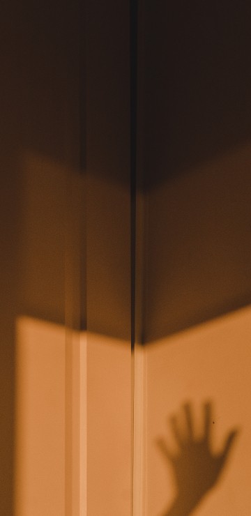Image brown wooden door with white wall