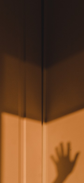 Image brown wooden door with white wall
