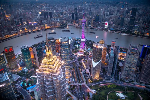 Image aerial view of city buildings during night time