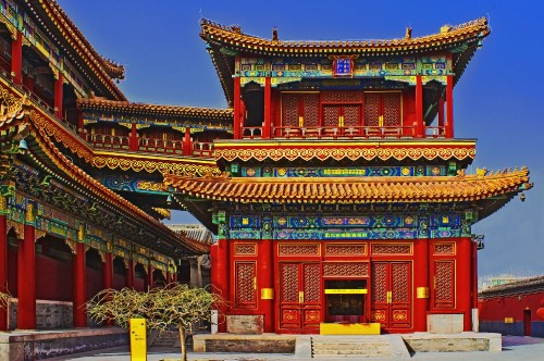 Image red and brown temple under blue sky during daytime