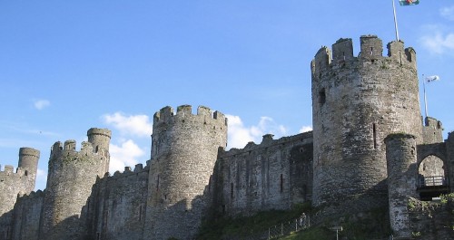 Image brown concrete castle under blue sky during daytime