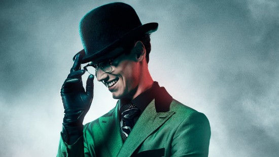 Image man in black hat and green suit jacket