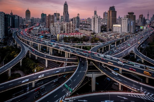 Image city buildings and road during daytime