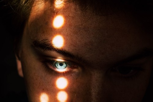 Image persons face with light