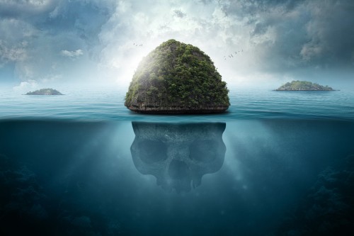 Image brown rock formation on body of water under white clouds and blue sky during daytime