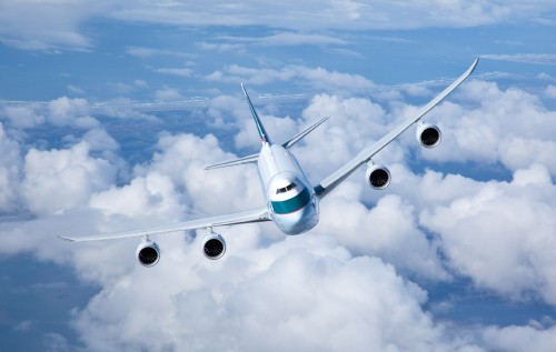 Image white airplane in the sky during daytime