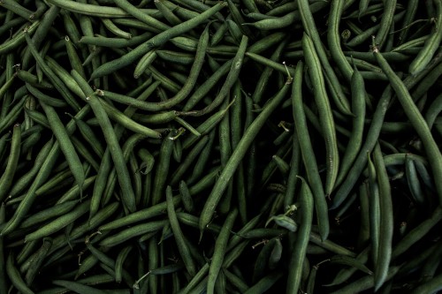 Image green chili lot on blue textile