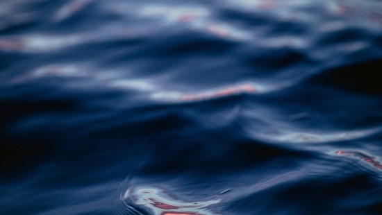 Image water drop on blue water