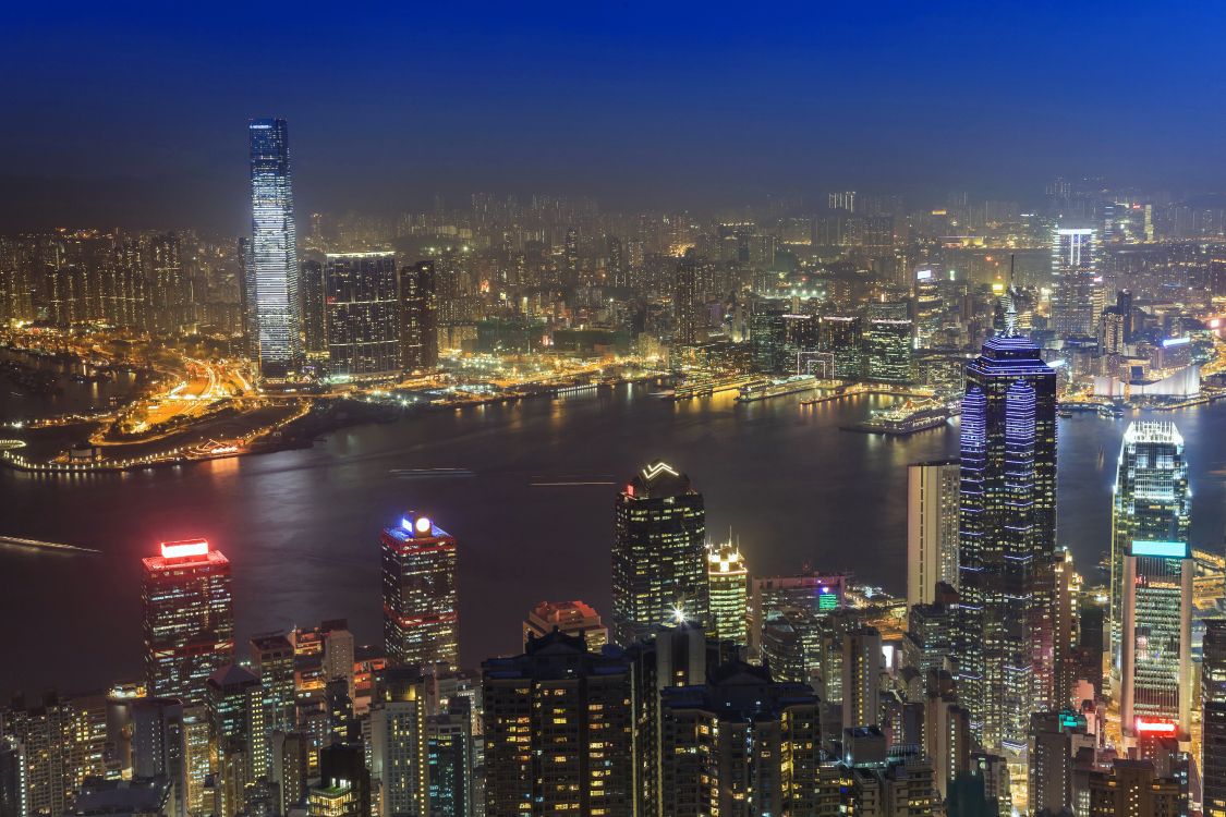 city skyline during night time