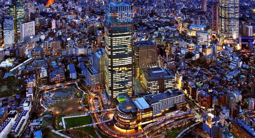 Image aerial view of city buildings during night time