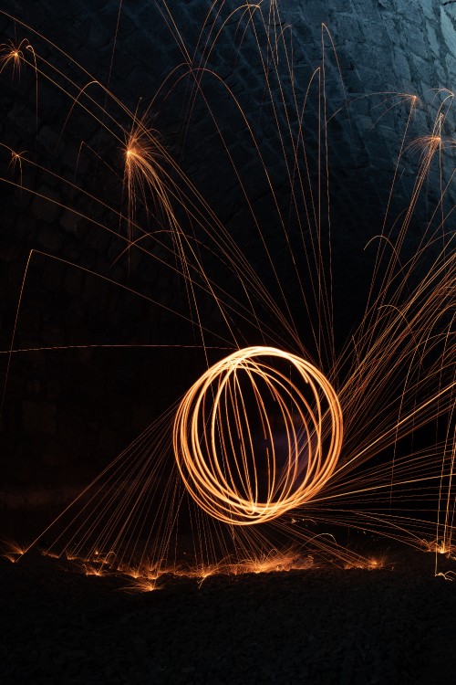 Image steel wool photography of man in black shirt