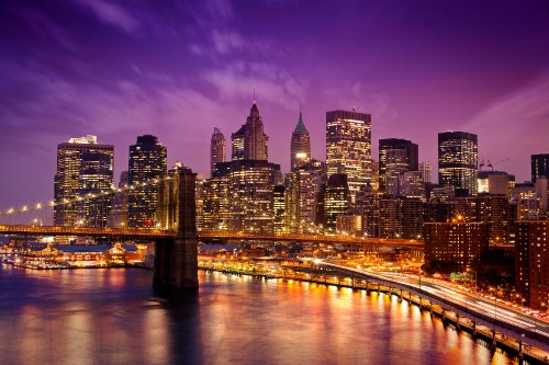 Image bridge over river during night time