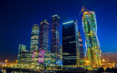 Image city buildings with lights during night time