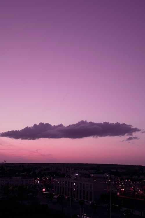 silhouette of city buildings during sunset