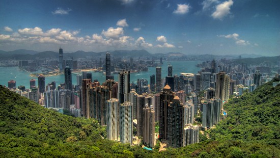 Image city skyline under blue and white cloudy sky during daytime