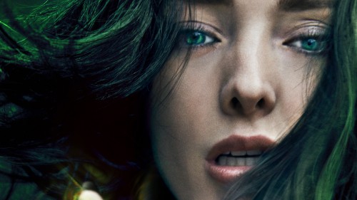 Image woman with black hair and green eyes