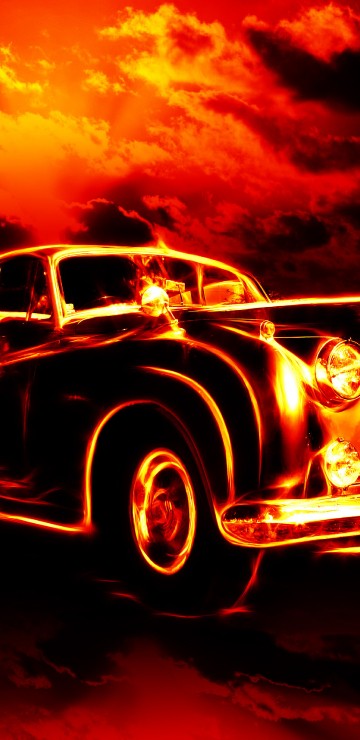 Image vintage car on black and orange sky