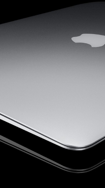 Image silver macbook on white background