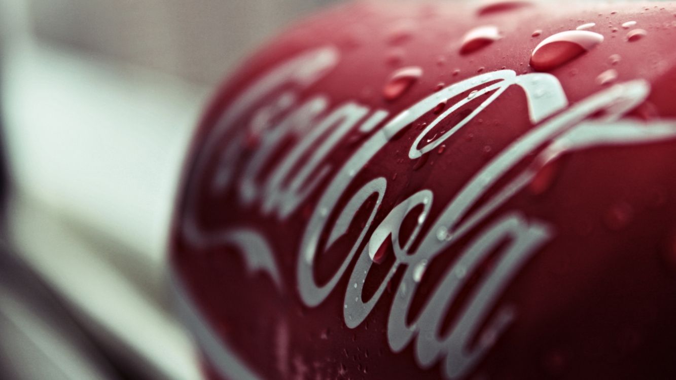 coca cola can in close up photography