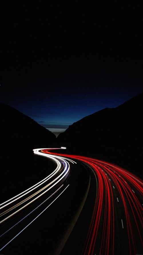 Image time lapse photography of cars on road during night time