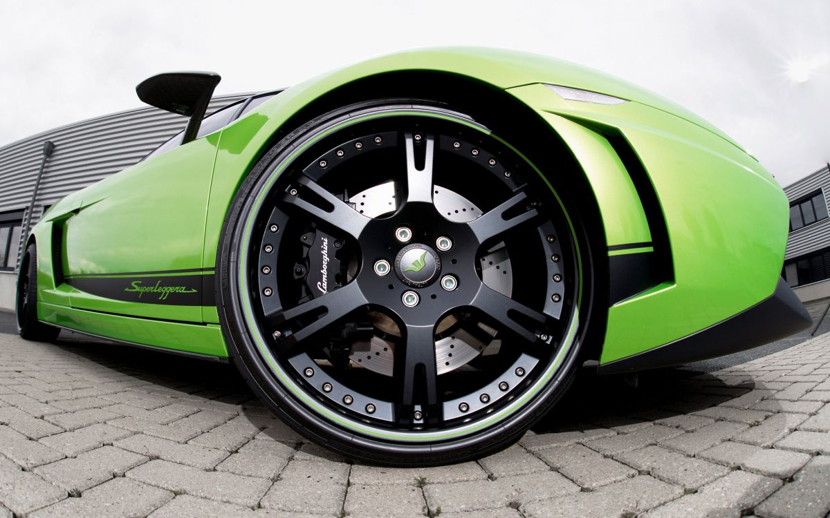 green and black car wheel