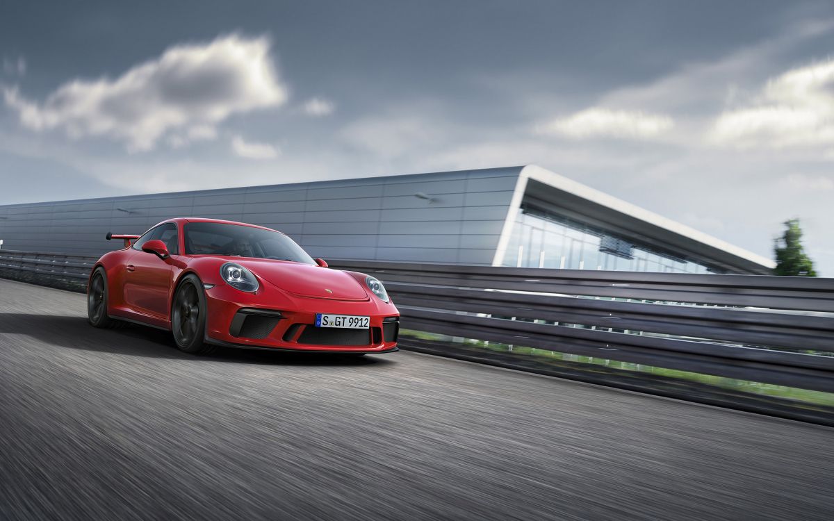 Roter Porsche 911 Unterwegs. Wallpaper in 2560x1600 Resolution