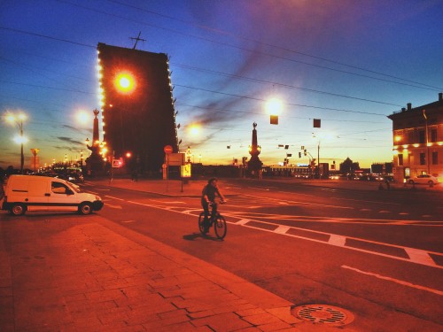 Image man riding bicycle on road during daytime