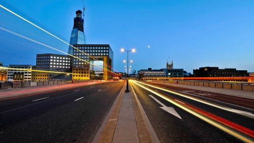 Image time lapse photography of cars on road during night time