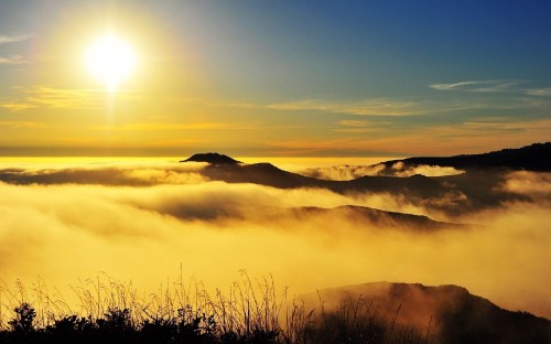 Image silhouette of mountain under cloudy sky during sunset