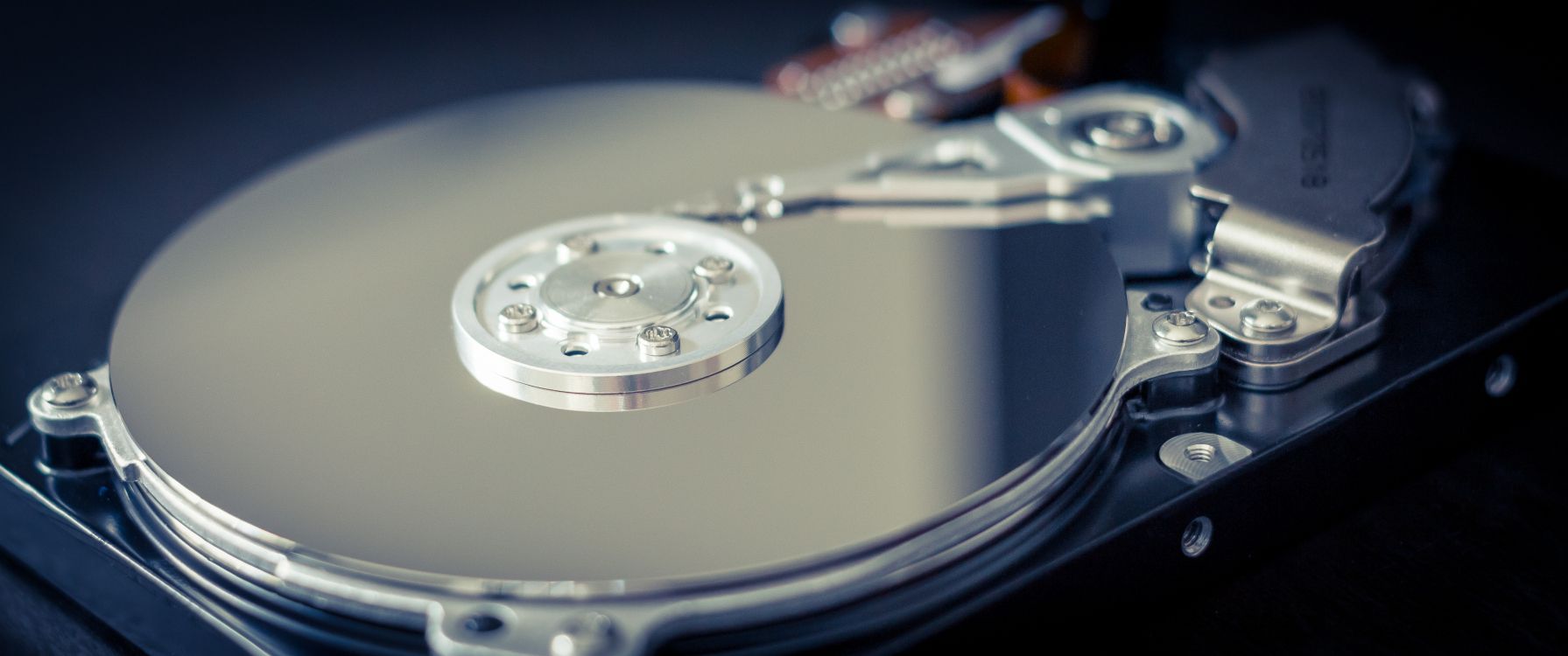 silver vinyl record player with vinyl record